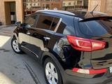 Kia Sportage 2013 года за 7 500 000 тг. в Караганда – фото 4