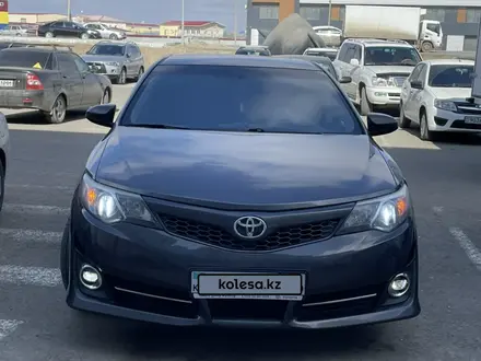 Toyota Camry 2013 года за 8 200 000 тг. в Атырау