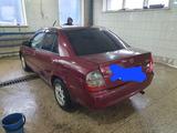 Mazda 323 2003 года за 1 500 000 тг. в Астана – фото 2