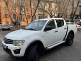 Mitsubishi L200 2012 года за 5 439 000 тг. в Алматы – фото 2