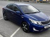 Kia Rio 2015 года за 4 100 000 тг. в Атырау – фото 2