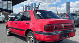 Mazda 323 1991 года за 380 000 тг. в Астана – фото 4