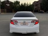 Toyota Camry 2013 года за 4 800 000 тг. в Актобе – фото 4