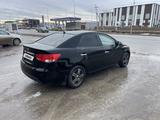 Kia Cerato 2011 года за 4 150 000 тг. в Атырау – фото 5