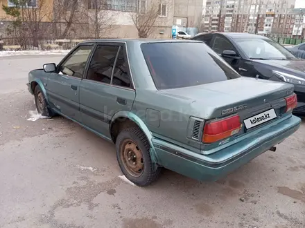 Nissan Bluebird 1990 года за 450 000 тг. в Караганда – фото 3