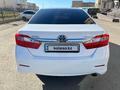 Toyota Camry 2013 года за 9 700 000 тг. в Актобе – фото 4