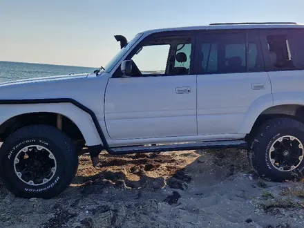 Toyota Land Cruiser 1991 года за 4 300 000 тг. в Жанаозен – фото 16