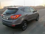 Hyundai Tucson 2014 годаүшін7 500 000 тг. в Уральск – фото 2