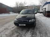 Kia Carnival 2000 года за 2 200 000 тг. в Караганда