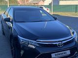 Toyota Camry 2014 года за 9 400 000 тг. в Атырау