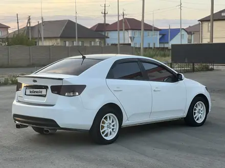 Kia Cerato 2012 года за 4 100 000 тг. в Атырау – фото 5