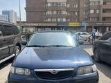 Mazda 626 1998 года за 1 900 000 тг. в Астана – фото 2