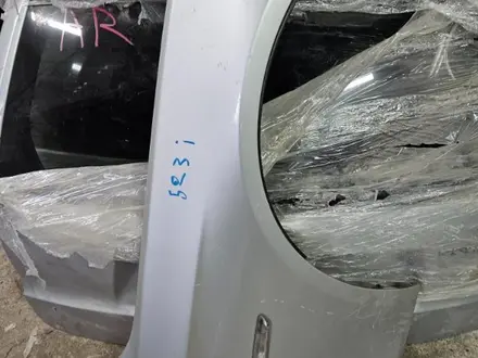 Крыло Bmw 5 F10 левое (б у) бмв ф10 за 75 000 тг. в Караганда