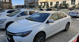 Toyota Camry 2015 года за 9 300 000 тг. в Жанаозен – фото 2