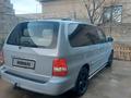 Kia Carnival 2005 года за 3 300 000 тг. в Шымкент – фото 11