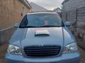 Kia Carnival 2005 года за 3 300 000 тг. в Шымкент – фото 13