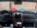 Kia Carnival 2005 года за 3 300 000 тг. в Шымкент