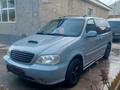Kia Carnival 2005 года за 3 300 000 тг. в Шымкент – фото 8