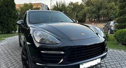 Porsche Cayenne GTS черный с водителем в Алматы