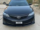 Toyota Camry 2014 года за 4 800 000 тг. в Жанаозен – фото 2
