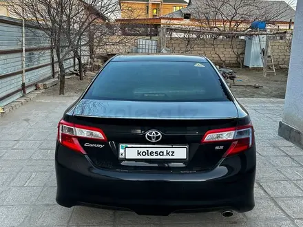 Toyota Camry 2013 года за 9 000 000 тг. в Жанаозен – фото 2