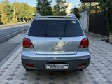 Mitsubishi Outlander 2003 года за 2 550 000 тг. в Шымкент – фото 4