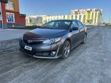 Toyota Camry 2014 года за 6 300 000 тг. в Актобе