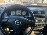 Mazda 323 2002 года за 1 700 000 тг. в Алматы – фото 2