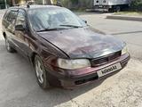 Toyota Carina E 1997 года за 1 550 000 тг. в Шымкент