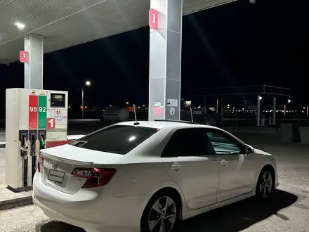 Toyota Camry 2013 года за 5 800 000 тг. в Жанаозен – фото 2