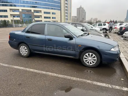 Mitsubishi Carisma 1999 года за 1 700 000 тг. в Астана – фото 3