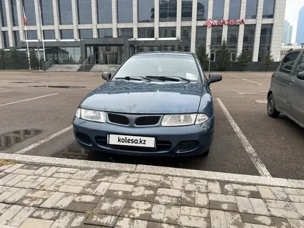 Mitsubishi Carisma 1999 года за 1 700 000 тг. в Астана – фото 2