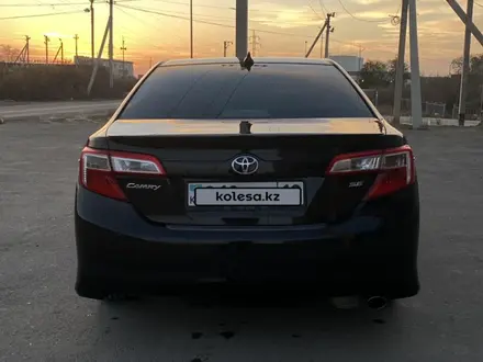 Toyota Camry 2012 года за 8 200 000 тг. в Жанаозен – фото 4