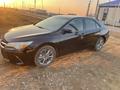 Toyota Camry 2015 года за 5 500 000 тг. в Атырау – фото 32