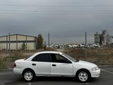 Mazda Familia 1997 года за 990 000 тг. в Астана – фото 3