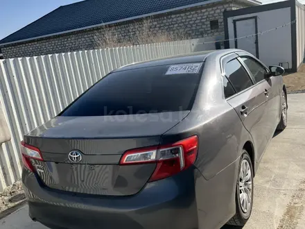 Toyota Camry 2014 года за 6 000 000 тг. в Кульсары – фото 2