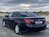 Toyota Camry 2013 года за 8 700 000 тг. в Атырау – фото 2