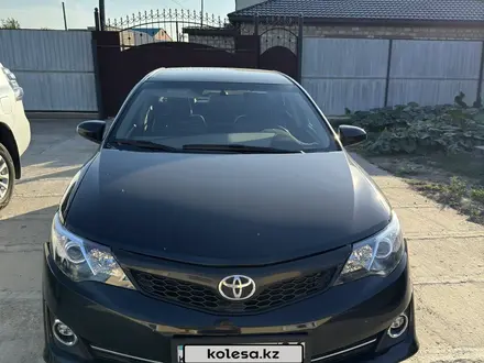 Toyota Camry 2013 года за 7 300 000 тг. в Атырау