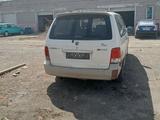 Kia Carnival 2001 года за 2 200 000 тг. в Караганда – фото 5