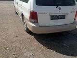 Kia Carnival 2001 года за 2 200 000 тг. в Караганда – фото 4