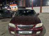 Mazda 323 2002 года за 950 000 тг. в Алматы – фото 2