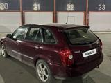 Mazda 323 2002 года за 950 000 тг. в Алматы – фото 5
