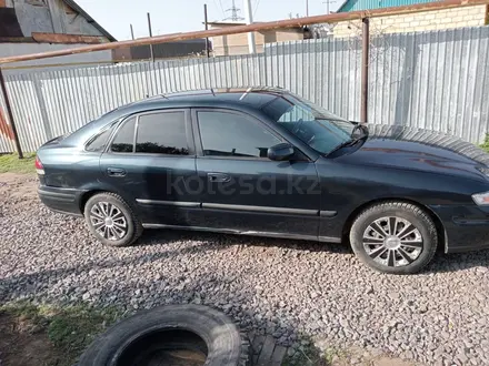 Mazda 626 1999 года за 1 850 000 тг. в Актобе – фото 5