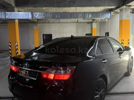 Toyota Camry 2015 года за 10 850 000 тг. в Астана – фото 12