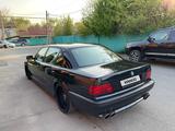 BMW 750 1999 года за 5 500 000 тг. в Алматы – фото 4