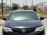 Toyota Camry 2013 года за 7 800 000 тг. в Жанаозен