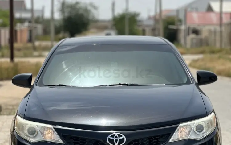 Toyota Camry 2013 года за 7 800 000 тг. в Жанаозен