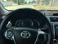 Toyota Camry 2013 года за 7 800 000 тг. в Жанаозен – фото 7
