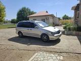 Kia Carnival 2005 года за 2 500 000 тг. в Шымкент