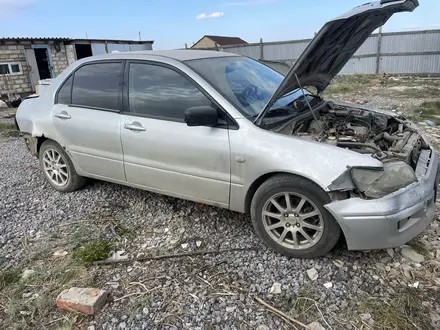 Mitsubishi Lancer 2002 года за 396 258 тг. в Актобе